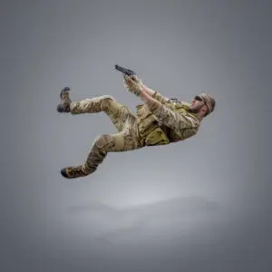 A man in camouflage is falling down.