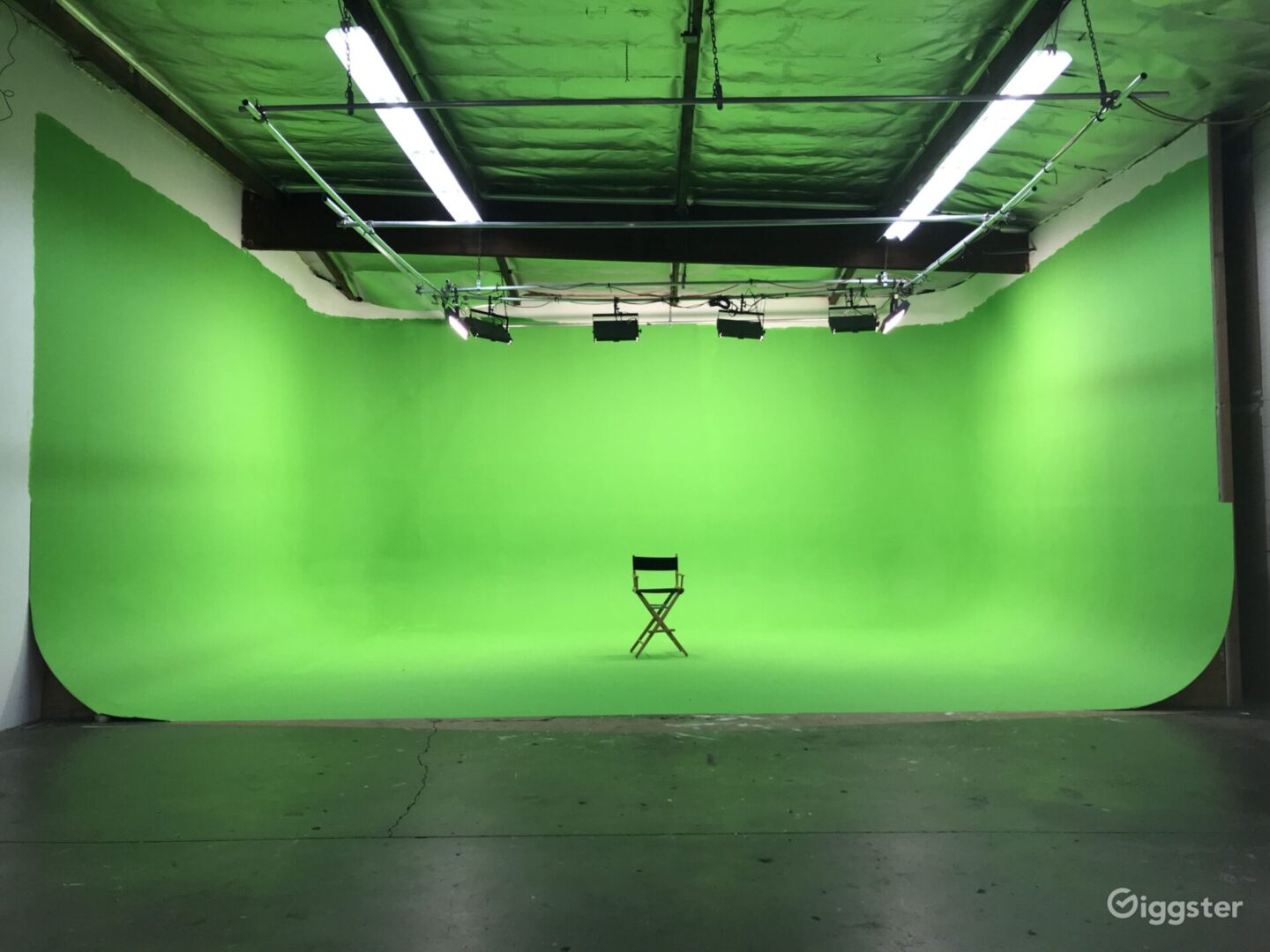 U-shaped Cyc Wall painted w/ Chroma Key Green.